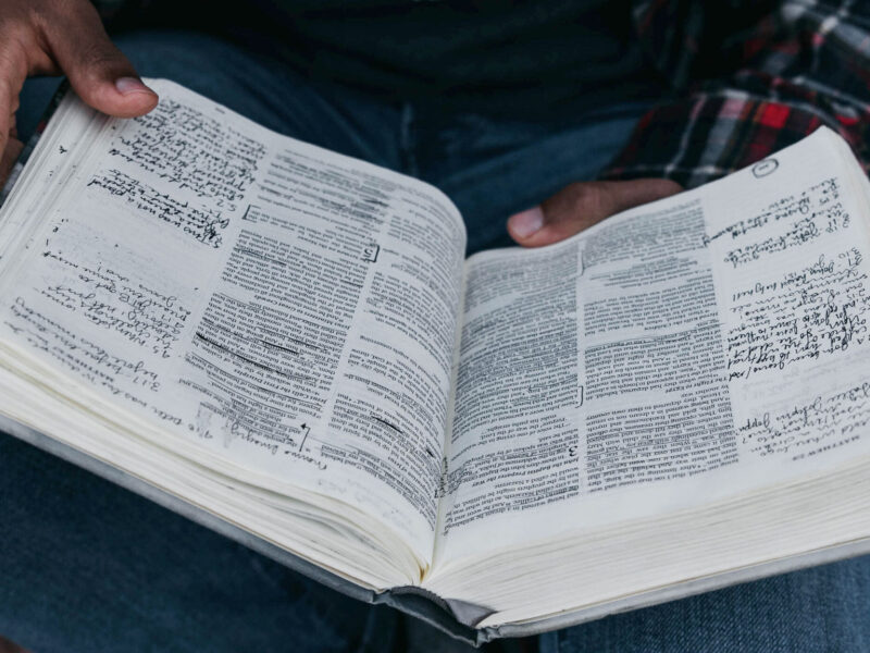 Man holding open Bible