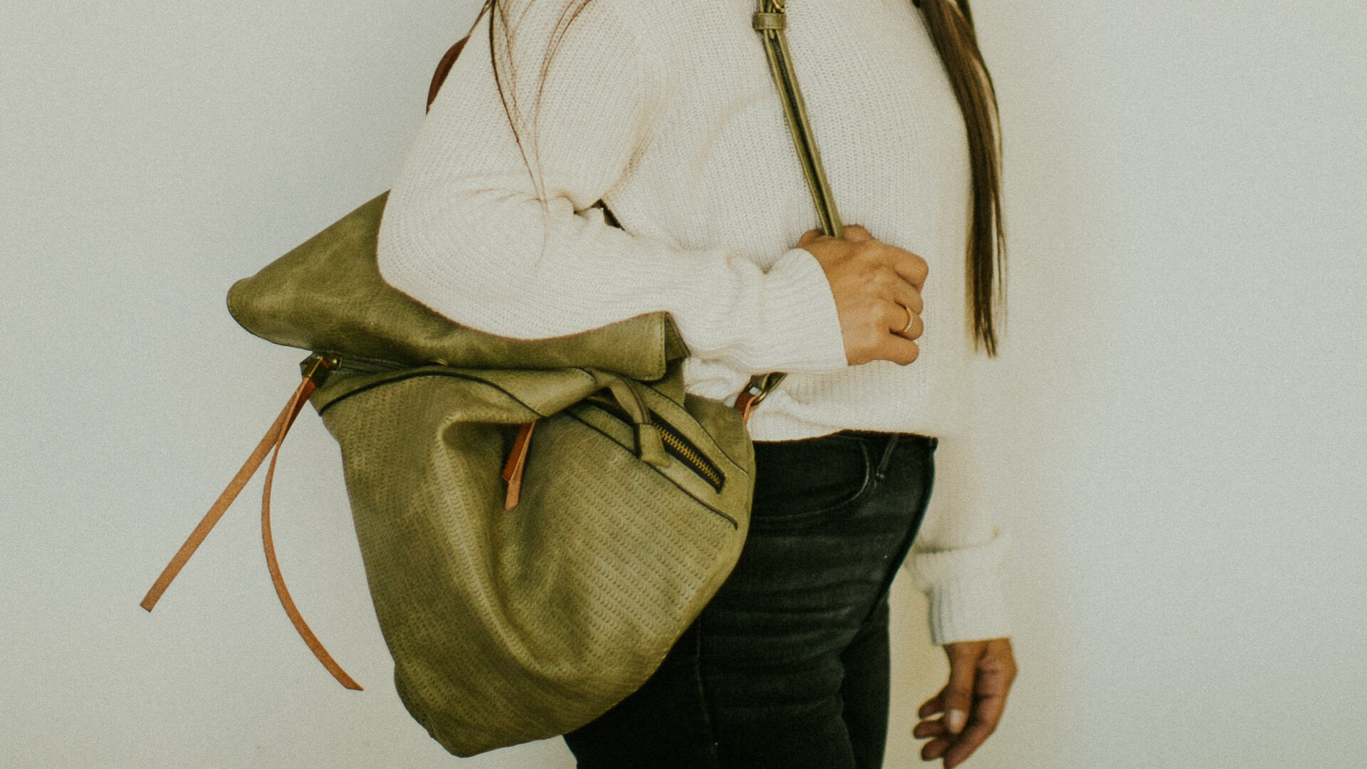 Women holding green bag